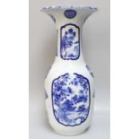 A Japanese Arita Porcelain Vase, Meiji period, with scalloped rim painted in underglaze blue with