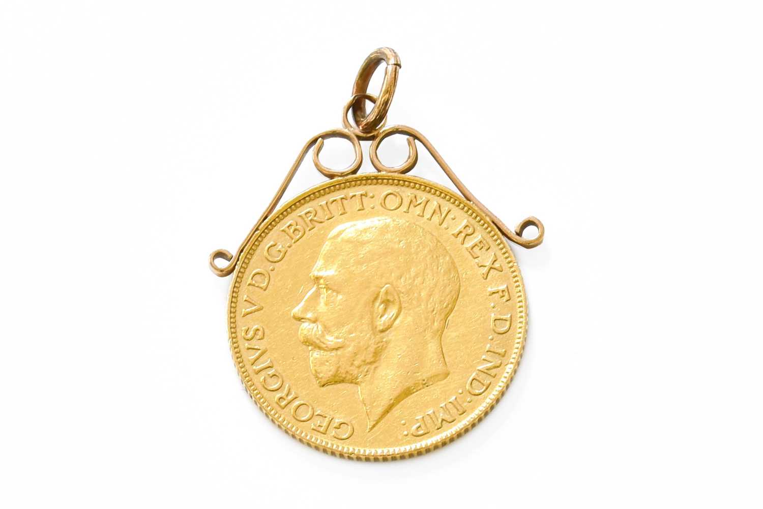 George V, Sovereign 1911; mounted as a pendant with soldered mount, coin good very fine, gross