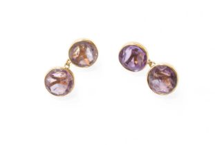 A Pair of Amethyst Cufflinks, the chain linked round cut amethysts in yellow rubbed over settings