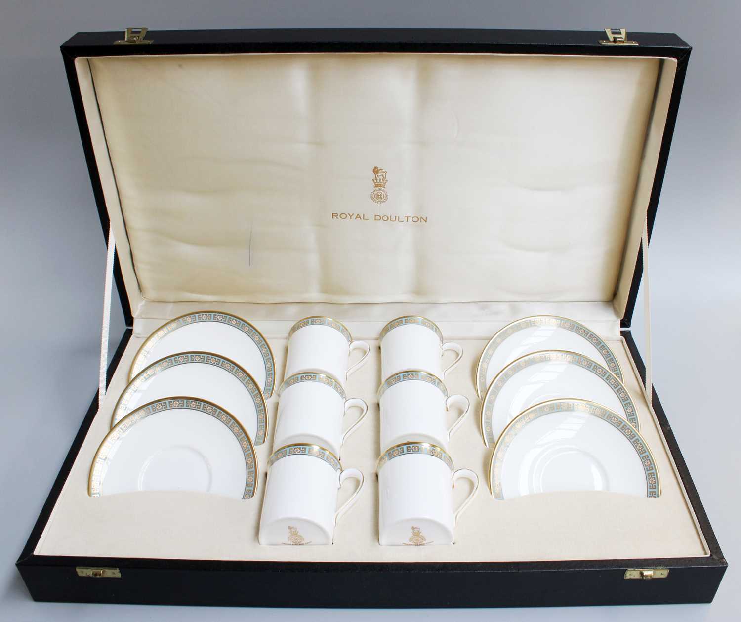 A Royal Doulton Porcelain Coffee Service, Athens pattern H4987, in fitted case, comprising six