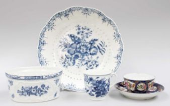 A Worcester Porcelain Teabowl and Saucer, circa 1770, powder blue ground, with shaped reserves