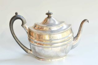 A George III Silver Teapot, by Peter and William Bateman, London, 1806, tapering oval and with