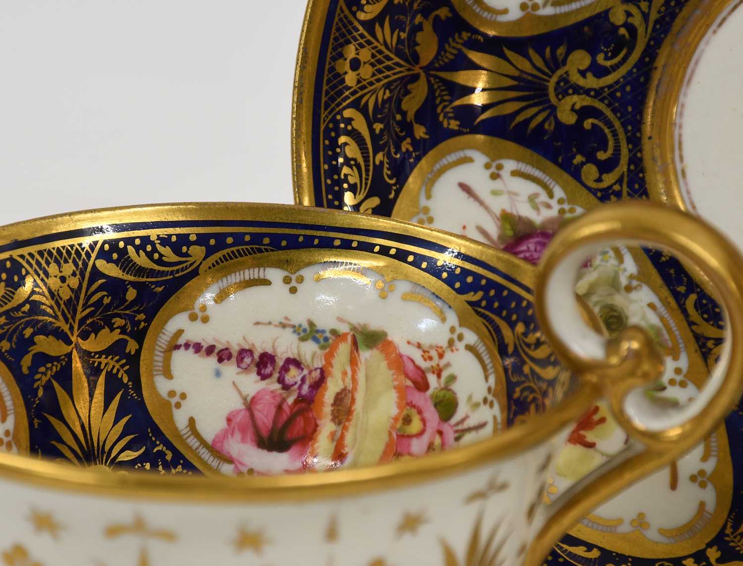 A Nantgarw Porcelain Teacup and Saucer, circa 1818-20, painted with buildings in landscape on a - Image 2 of 13