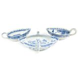 A Chinese Porcelain Double-Lipped Sauceboat, 18th century, with twin loop handles formed as foxes,