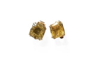 A Pair of Smoky Quartz Earrings, the cushion cut smoky quartz in yellow double claw settings, with