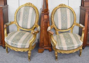 A Pair of Louis XV Style Part-Upholstered Gilt Armchairs, 20th century (2)