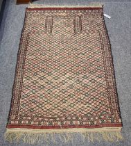 Turkmen Flatweave Prayer Rug, the ivory diamond lattice field beneath the mihrab, enclosed by narrow