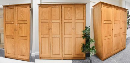 A Set of Three Matching 20th Century Oak Wardrobes; double, 99cm by 64cm by 194cm, treble, 143cm