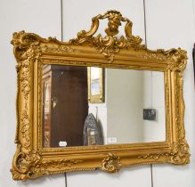 A Gilt Framed Rectangular Hanging Wall Mirror, with openwork pediment adorned with a portrait bust