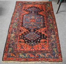 Kurdish Rug, the midnight blue field with indigo central panel framed by spandrels and borders of