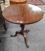 A George III Mahogany Tripod Table, with circular tilt top, 73cm diameter by 70cm
