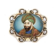 A Portrait Miniature Brooch, the oval frame containing a miniature depicting a gentleman in