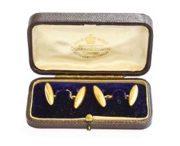 A Pair of Cufflinks, formed of chain linked torpedo motifs, stamped '18CT' Provenance: Dutton Manor,