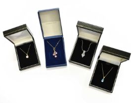 Four Pendants on Chains, comprising of a pink cubic zirconia pendant on chain, the trio of faceted