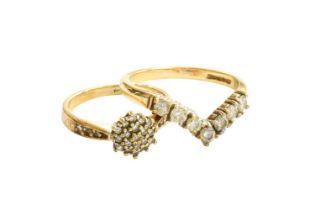 A 9 Carat Gold Diamond Wishbone Ring, the round brilliant cut diamonds in yellow channel settings,