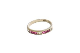 An 18 Carat Gold Ruby and Diamond Half Hoop Ring, single round brilliant cut diamonds spaced by