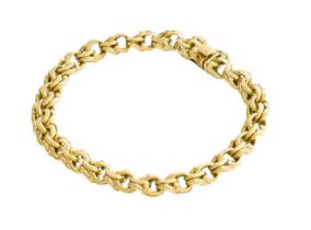 A Fancy Link Bracelet, clasp stamped '18K', length 20cm Gross weight 33.0 grams