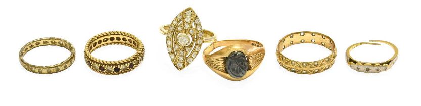 Six Rings, comprising of four 9 carat gold rings, including a hematite signet ring (a.f.); a diamond