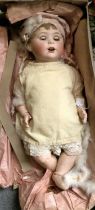 An Early 20th Century German Bisque Head Doll by Jutta, in original box