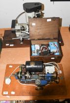 An Enco Unimat 3 Watchmaker's Lathe and Lathe Attachments, in a wooden box, together with a Wizard