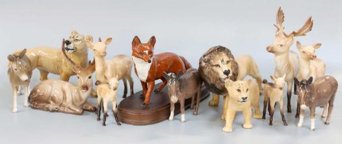 Beswick Wild Animals, including Lion, Lioness and Cub; various deer, donkeys and a running fox on