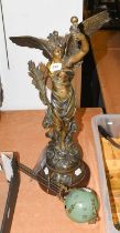 A French Figural Spelter Mystery Clock, early 20th century (a/f)
