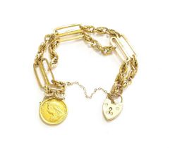 A Double Row Fancy Link Bracelet, stamped '9' and '.375', suspending a half sovereign dated 1897,