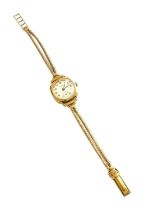 A 9 Carat Gold Lady's J W Benson Wristwatch Gross weight: - 22 grams  Hand setting correctly,