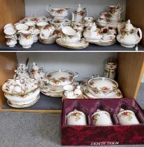 A Large Quantity of Royal Albert Old Country Roses Tea and Dinner Wares (two shelves) After a