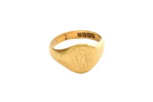 An 18 Carat Gold Signet Ring, finger size Q Gross weight 6.3 grams.
