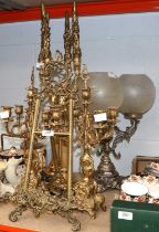 A Pair of Reproduction Brass Four Light Candelabra, a rococo style brass easel, 56cm, two