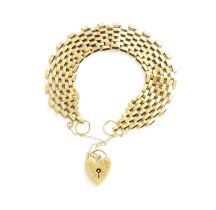 A Brick Link Bracelet, stamped '9' and '375', with a 9 carat gold padlock clasp, length 17.5cm Gross