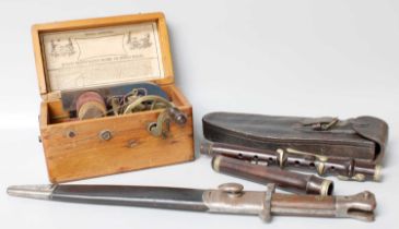 A British P. 1888, MKII Bayonet, together with a Hawkers & Son Flute, in leather case, and an "