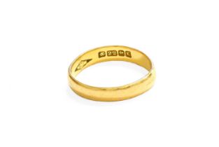 A 22 Carat Gold Band Ring, finger size K1/2 (approximately, shank misshapen) Gross weight 3.2 grams