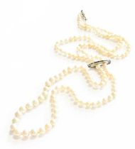 A Cultured Pearl Necklace, comprising of graduated cultured pearls, knotted to a white torpedo