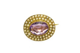 An Amethyst and Split Pearl Brooch, the oval cut amethyst in a yellow millegrain setting within a