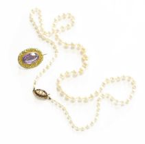 A Cultured Pearl Necklace, the graduated cultured pearls, knotted to a garnet and cultured pearl