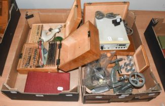 Watch and Clockmaker's Tools, including: two cased staking tools, a clock mainspring winder, a watch