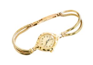 A 1950's 9 carat lady's Tudor wristwatch Gross Weight: 16.9 grams Hand setting correctly, winding