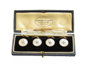 Four Mother-of-Pearl Buttons, stamped '9CT', cased; together with A Split Pearl Brooch, depicting