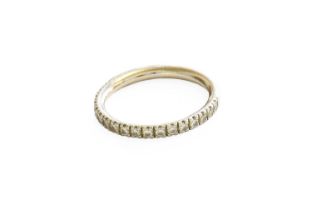 A Platinum Diamond Half Hoop Ring, the round brilliant cut diamonds in claw settings, to a plain