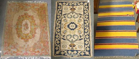 Kashmir Chain Stitch Rug, the cream field with oval floral medallion enclosed by leafy borders,