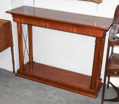 A Reproduction Regency Style Mahogany Console Table, on four cylindrical supports joined by a pot