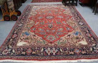 Unusual Oriental Carpet, the terracotta field of palmettes and vines centred by a flowerhead