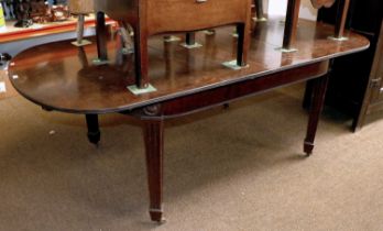 A 19th Century Mahogany Dining Table, on tapering square section fluted legs, with two additional