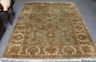 Indian Carpet of Ziegler Design, the mint green field with an allover design of large palmettes