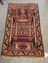 Afghan Baluch Prayer Rug, the indigo field with stylised mosque beneath the Mihrab enclosed by