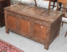 An 18th Century Carved Oak Three Panel Coffer, 129cm by 60cm by 66cm