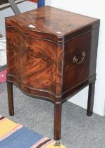 A George III Mahogany Serpentine Fronted Cellerette, 45cm by 43cm by 72cm Front left leg neads