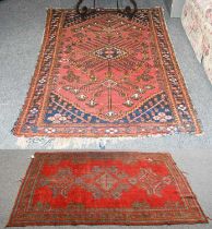 Ushak Rug, the blood red field with column of skeletal medallions enclosed by narrow borders,
